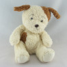 Doudou et compagnie chien couché blanc marron