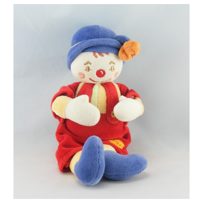 Doudou Clown salopette rouge chapeau bleu fleur Sucre d'Orge
