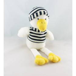 Doudou canard dans sa voiture bleu