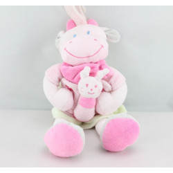 Doudou musical vache rose robe verte NICOTOY