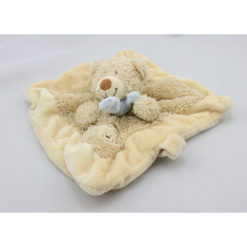 Doudou plat ours Beige écru écharpe bleu NICOTOY
