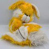 Ancienne peluche range pyjama lapin orange blanc