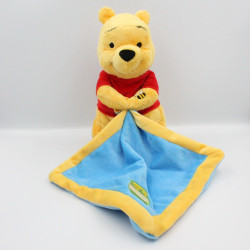 Doudou Winnie l'Ourson avec mouchoir bleu miel Disney Nicotoy