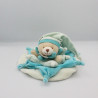 Doudou et compagnie ours bleu vert col étoile carambole