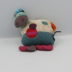 Doudou musical vache Les Jolis pas beaux MOULIN ROTY