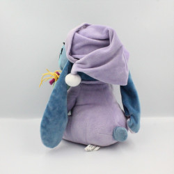 Peluche bébé Stitch avec monstre et biberon Lilo et Stitch DISNEYLAND