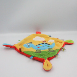Doudou plat dinosaure bleu jaune rouge vert NICOTOY