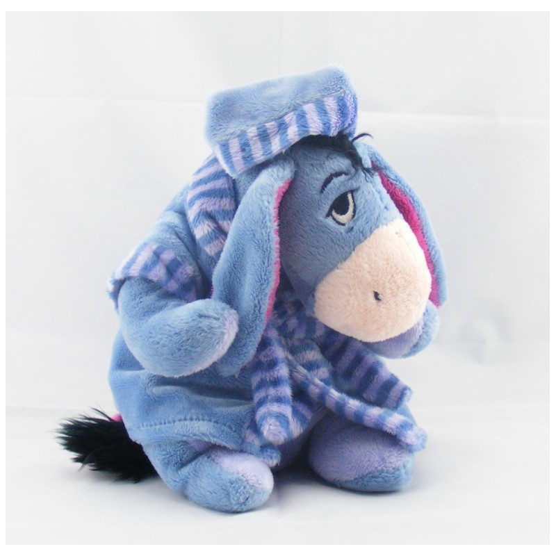 Doudou Bourriquet allongé endormi en pyjama vert Disney
