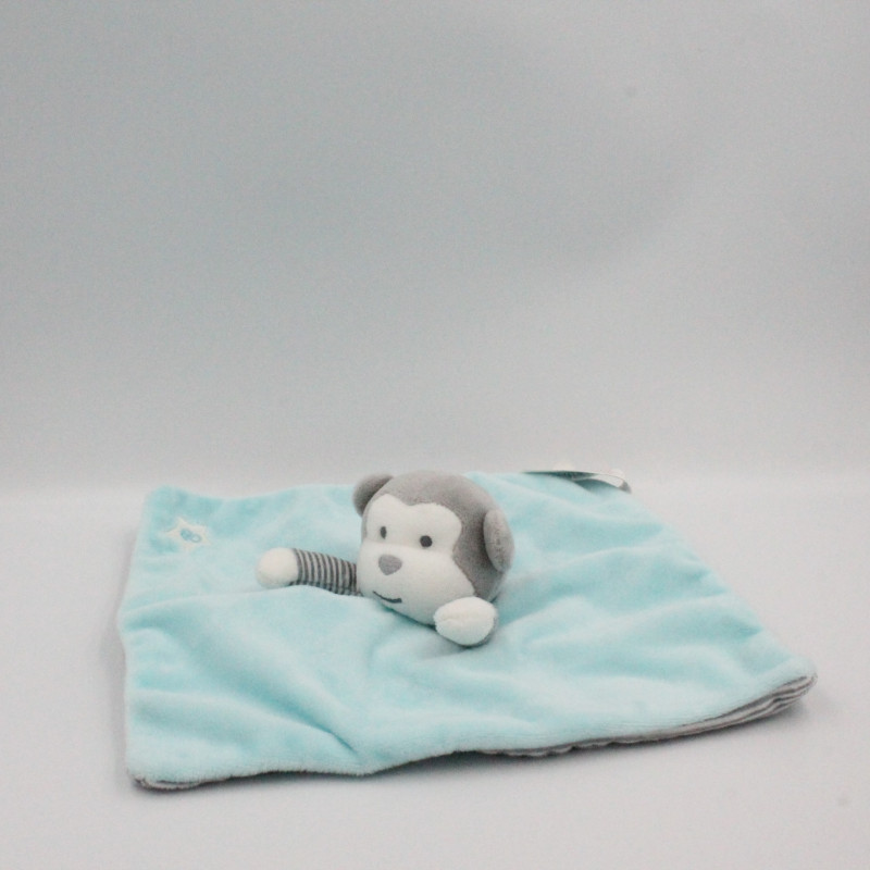 Doudou plat singe bleu blanc rayé OBAIBI OKAIDI