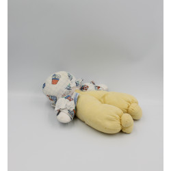 Doudou poupée lutin jaune blanc bleu fleurs NOUNOURS