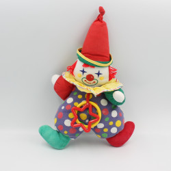 Doudou clown bleu vert rouge jaune pois hochet COROLLE