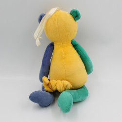Doudou musical singe jaune bleu vert SUCRE D'ORGE
