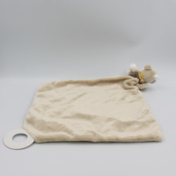 Doudou plat mouchoir Bono le singe beige foulard jaune NOUKIE'S