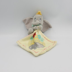 Doudou éléphant gris Dumbo mouchoir jaune DISNEY NICOTOY
