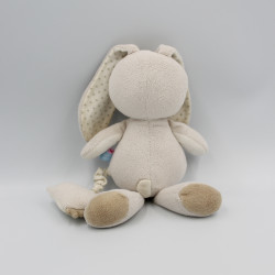 Doudou musical lapin beige blanc étoiles Sucre d'Orge