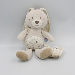 Doudou musical lapin beige blanc étoiles Sucre d'Orge