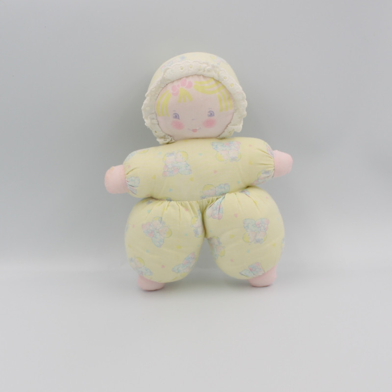 Ancien doudou poupée bébé jaune motifs COROLLE