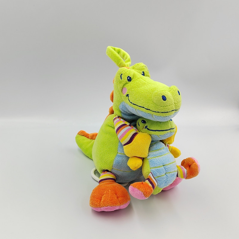 Doudou musical crocodile vert bleu rose NICOTOY
