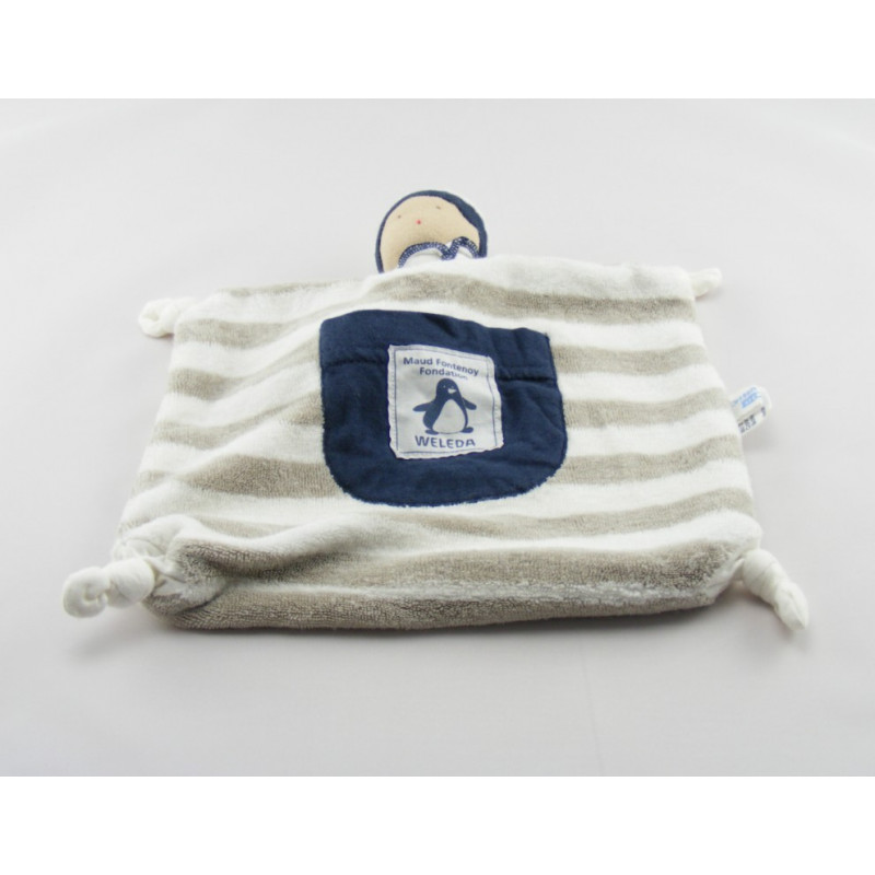 Doudou plat lutin fleur blanc orange vert WELEDA