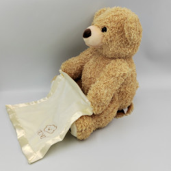 Peluche interactive ours beige mouchoir GUND