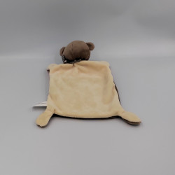 Doudou plat singe marron rouge vert pois NICOTOY