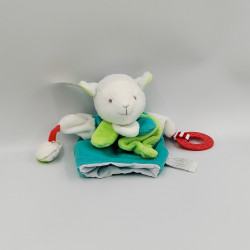 Doudou et compagnie marionnette eveil mouton blanc bleu vert rouge Magic