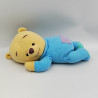 Doudou winnie l'ourson couché allongé en pyjama bleu DISNEY