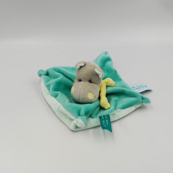 Petit doudou plat hippopotame bleu jaune BABY NAT