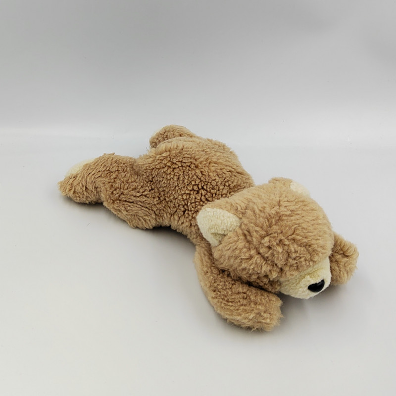 Ancienne peluche ours beige couché