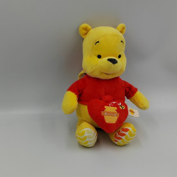 Doudou musical winnie l'ourson rouge jaune coeur miel DISNEY NICOTOY