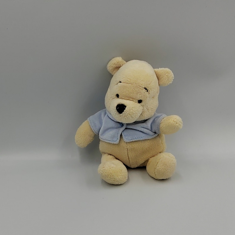 Doudou Winnie l'Ourson blanc créme pull bleu Disney