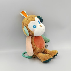 Doudou musical singe beige bleu vert rouge KALOO