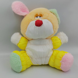 Peluche Puffalump chien jaune vert rose blanc toile