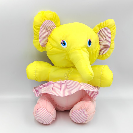 Peluche Puffalump éléphant jaune jupe rose rayé