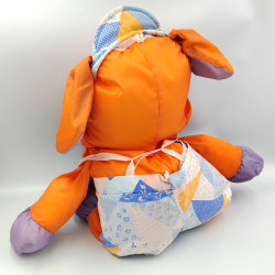 Peluche Puffalump chien orange violet en toile avec salopette casquette