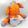 Peluche Puffalump chien orange violet en toile avec salopette casquette