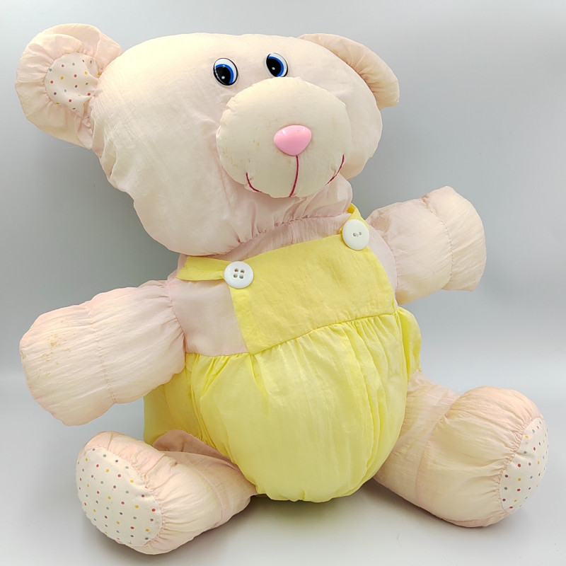 Peluche Puffalump ours rose jaune en toile