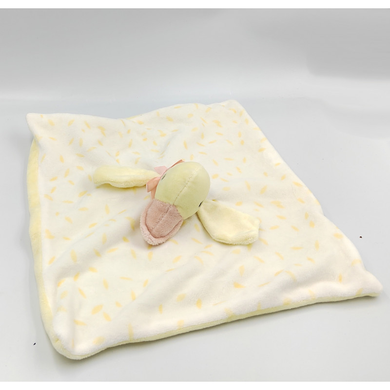 Doudou plat canard jaune blanc noeud orange Primark