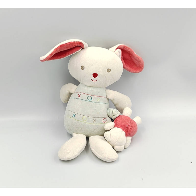 Doudou musical lapin blanc rouge bleu SUCRE D'ORGE