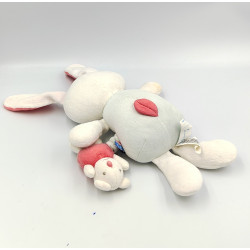 Doudou musical lapin blanc rouge bleu SUCRE D'ORGE