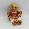 Peluche ours marron robe rouge motifs FRANCOISE SAGET