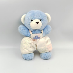 Doudou Ours bleu salopette blanc rose motifs NOUNOURS