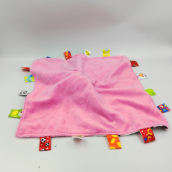 Doudou plat vache rose noir blanche étiquettes