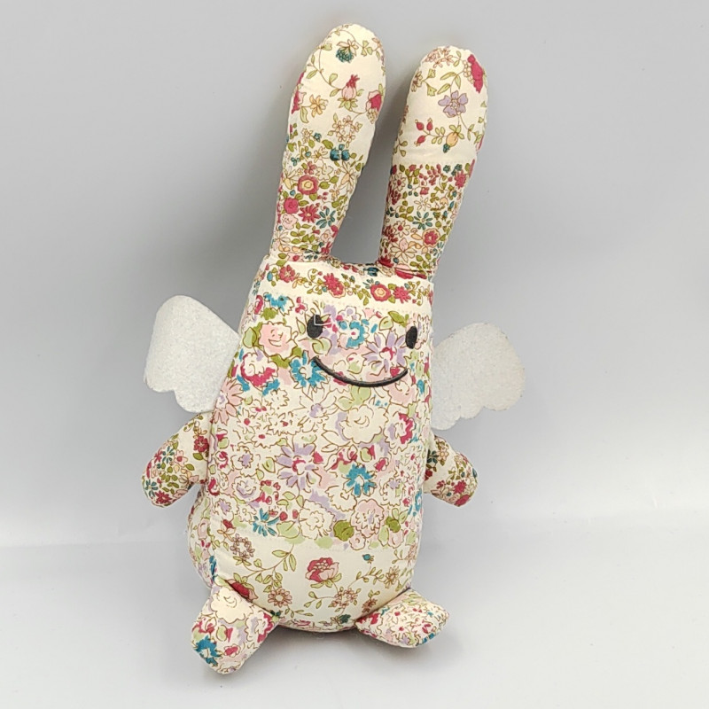 Doudou musical lapin ange fleurs TROUSSELIER