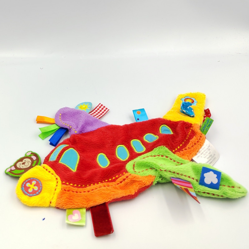Doudou plat avion rouge vert jaune étiquette LABEL