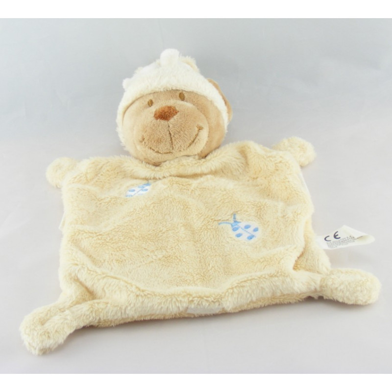 Doudou plat ours écru bonnet coccinelle brodée NICOTOY