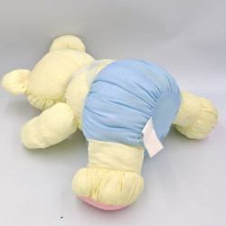 Peluche Puffalump ours jaune bleu rose en toile Fluffy BIKIN