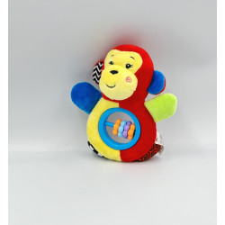 Doudou hochet singe rouge jaune bleu vert TENDERTOYS