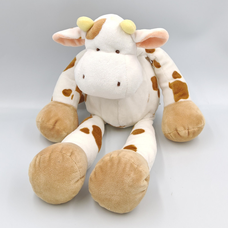 Doudou Vache blanche taches marron Nicotoy