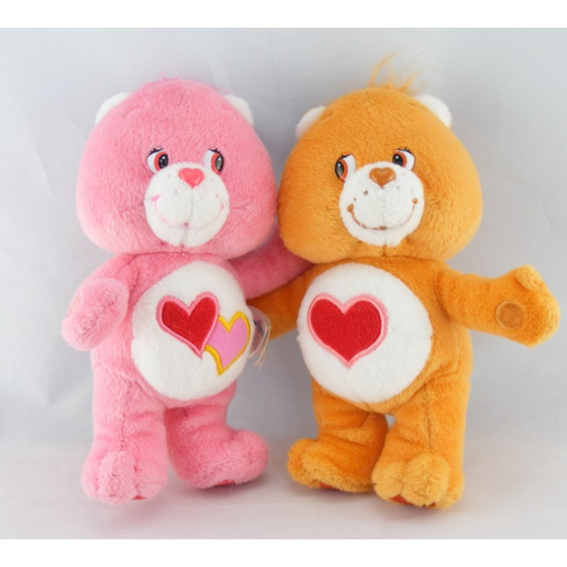 Peluche Bisounours rose Groschéri avec 2 coeurs CARE BEARS 22 cm